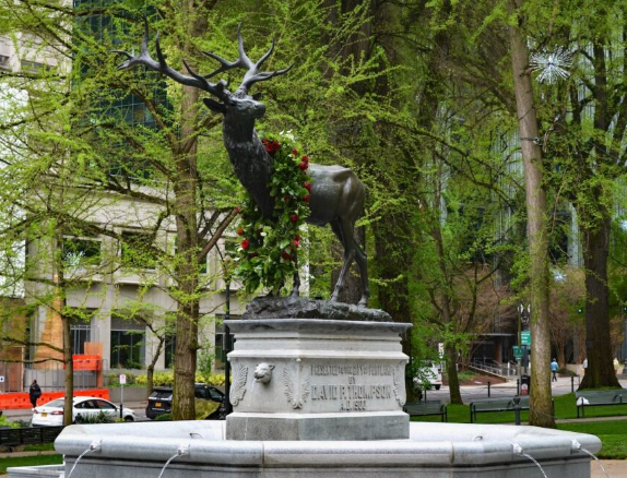 Stone and Wood Elk Sculptures